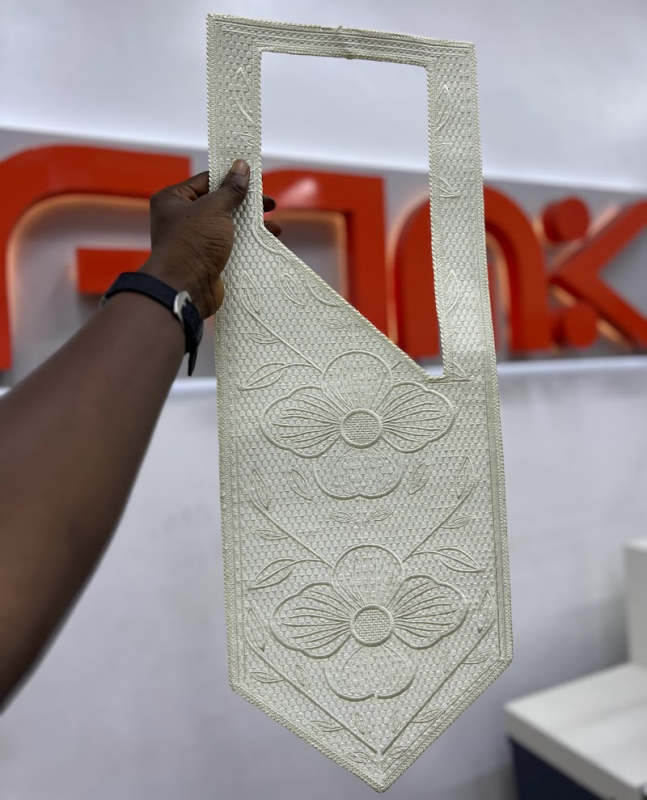 An Agbada embroidery cape from FAMK Apparel