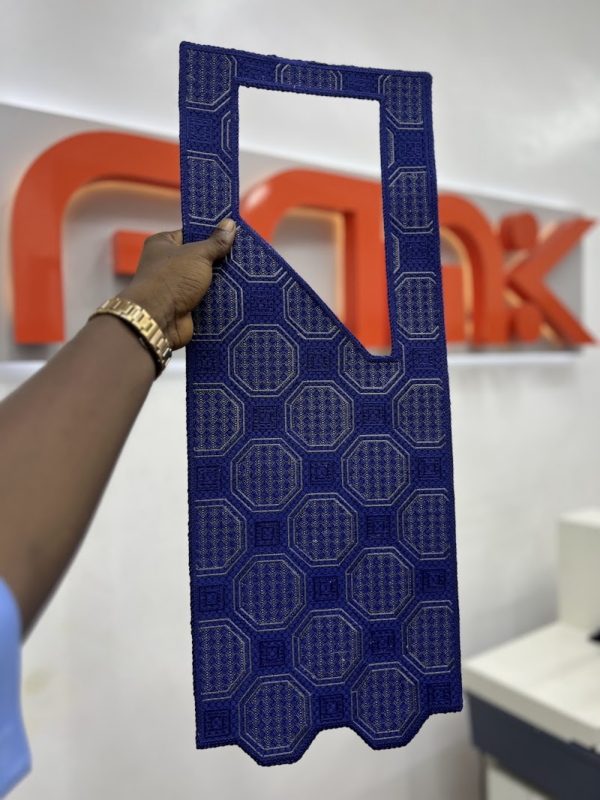 A digitally embroidered agbada cape