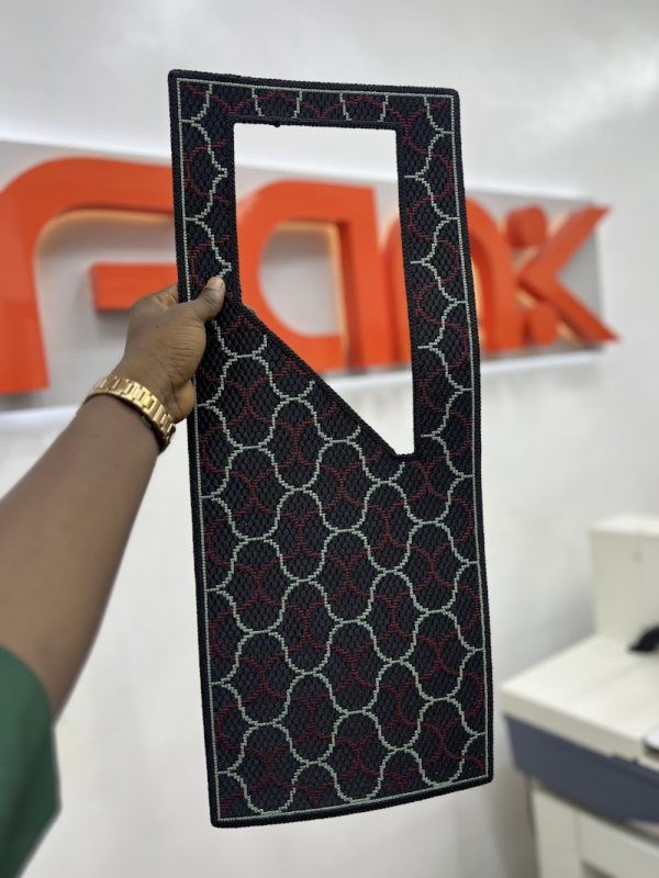 An agbada cape made by an embroidery machine