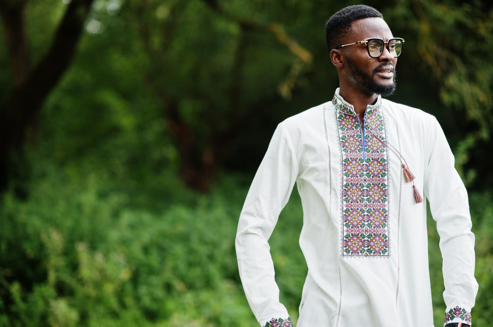 A man with a minimal collar embroidery