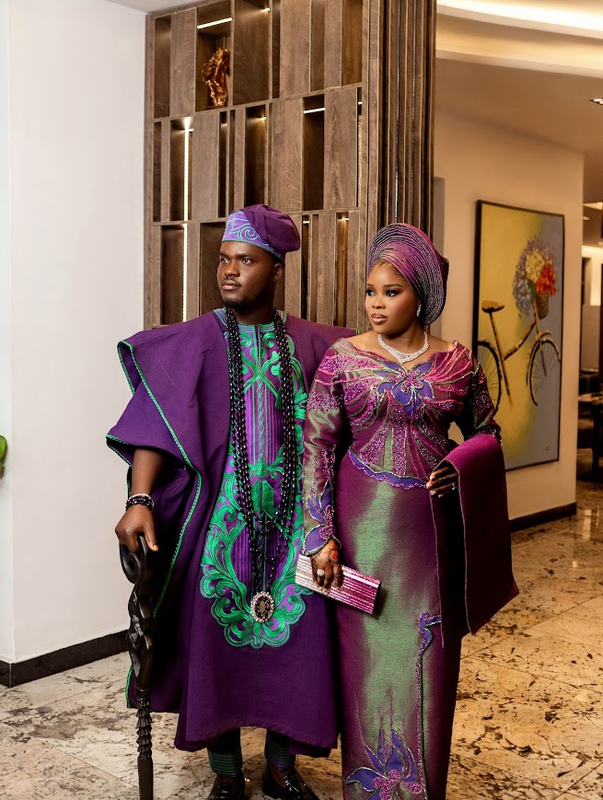 a couple wearing bespoke agbada 